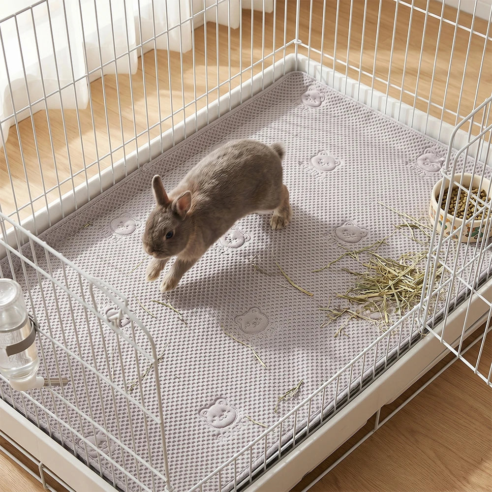Tapis imperméable pour rongeur - installé dans la cage