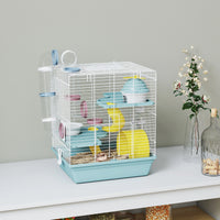 Hamster dans sa cage à 3 niveaux