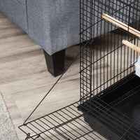 Cage à oiseaux à toit ouvrant, détail des gamelles