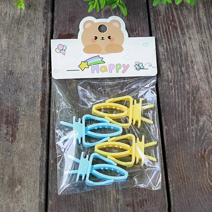 Pince porte-fruits pour oiseau - coloris disponible